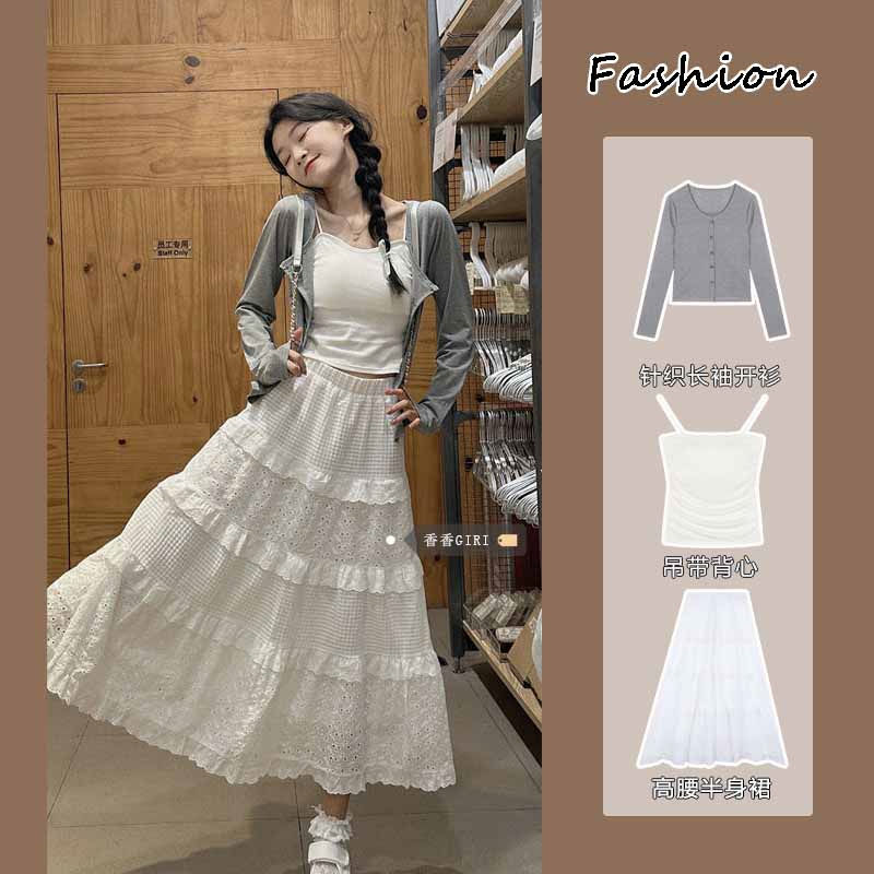 Gentle wind hollow high-waisted skirt suit for women autumn knitted long-sleeved cardigan pure desire slimming camisole