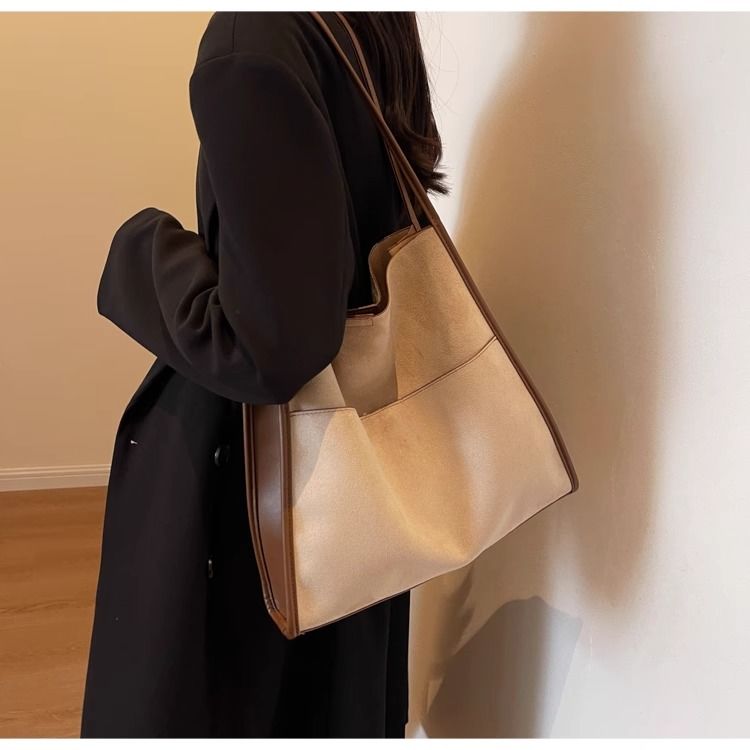 FOUR ONE large capacity women's versatile new single shoulder bucket bag, popular commuting tote bag this year_voghion.com