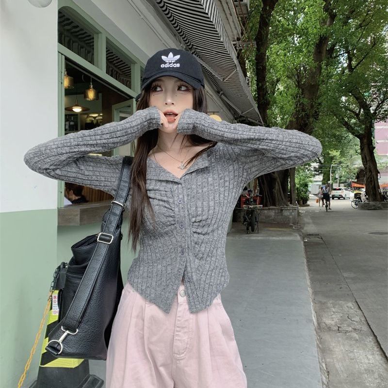 Designed long-sleeved hot girl sweater women's autumn new chic pleated slim slim irregular short top trendy