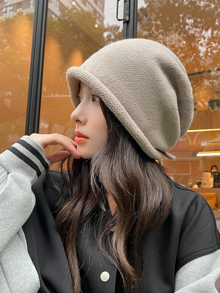 Drawstring pile hat for women, autumn and winter face-showing small cold hat, 2023 hot style warm knitted hat, Baotou woolen hat for men