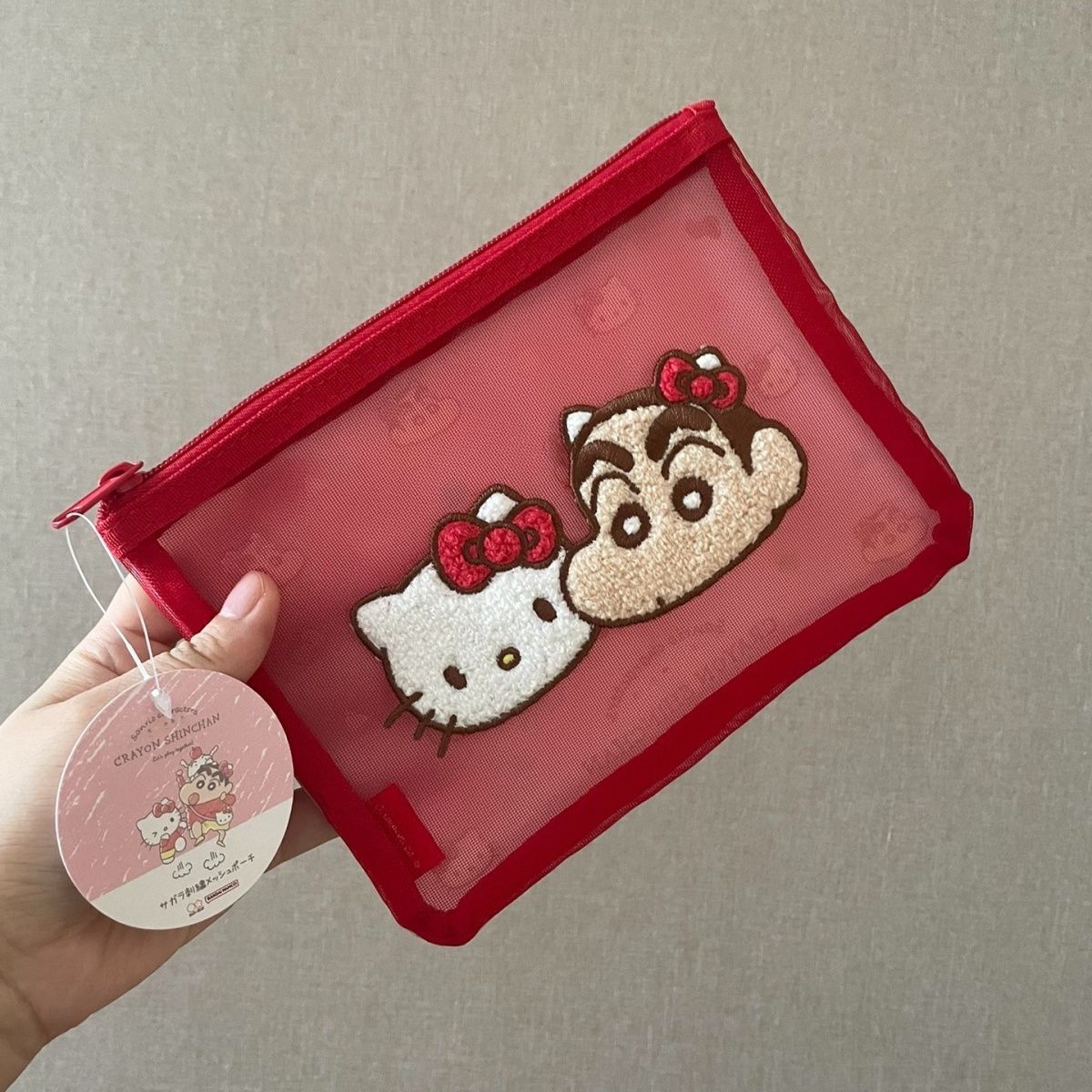 Sanrio Hello Kitty Crayon Shin-chan co-branded cosmetic bag coin purse mesh pvc stitching storage bag