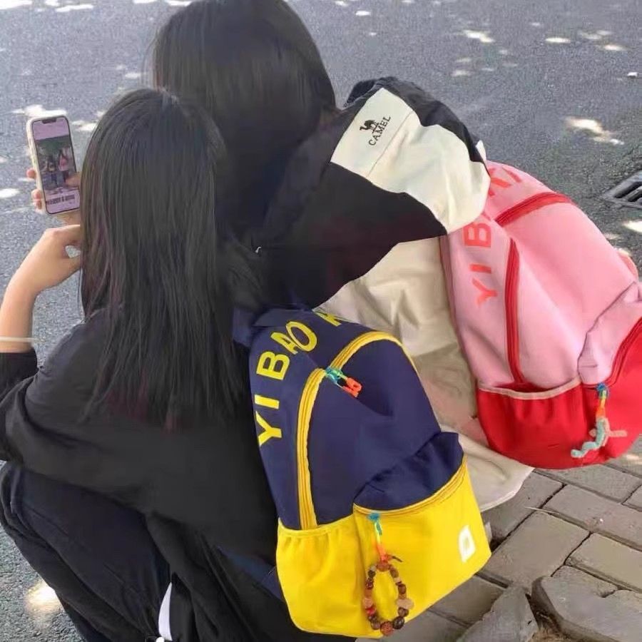 高顏值雙肩包設計感小眾大容量百搭旅行帆布背包撞色高中生雙肩包