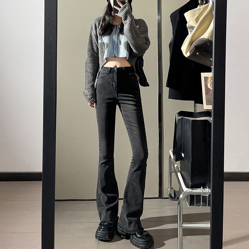 Autumn and winter designed raw edges to make you look taller and slimmer, pear-shaped stretch micro-flare jeans, large size black and gray horse hoof pants, trendy