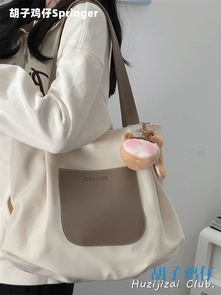 大容量包包女韓版少女簡約休閒百搭通勤單肩包潮托特包輕便旅行包