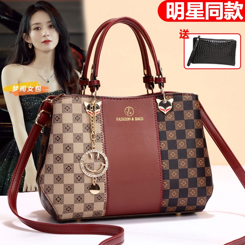真皮質感大包包女2023新款印花女包休閒中年媽媽包單肩斜挎手提包