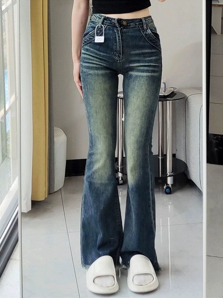復古辣妹高腰微喇叭牛仔褲女秋冬新款設計感美式毛邊修身顯瘦長褲