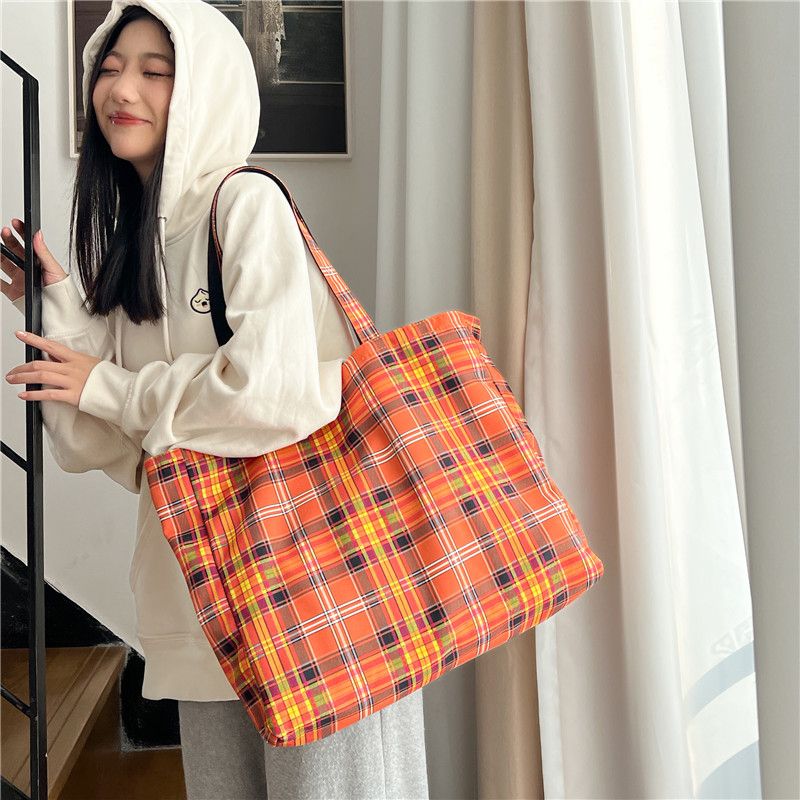 Niche retro plaid orange tote bag, portable commuting large capacity armpit bag, high-looking fashionable lightweight cloth bag