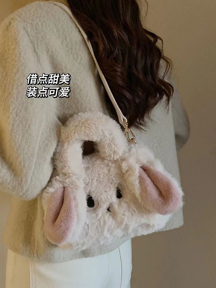小眾設計毛絨大耳朵可愛手提斜跨包2023秋冬新款大眼睛俏皮毛毛包