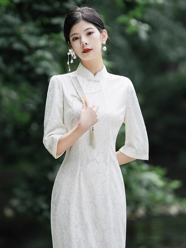 蕾絲旗袍新款2023年輕款高端氣質秋季少女米白色魚尾改良連衣裙冬
