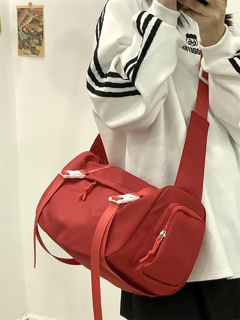 Japanese 2023 new simple large-capacity sports cross-body bag for female students commuting Korean style high-end shoulder mountaineering bag