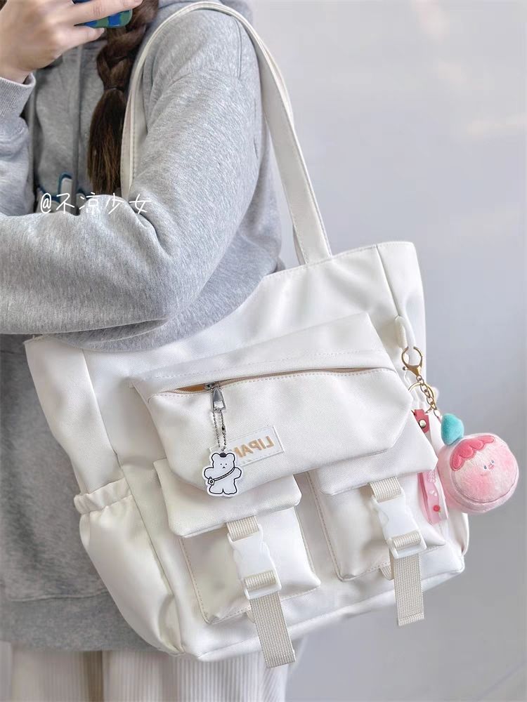 Simple large-capacity commuter shoulder bag Japanese style ins versatile portable tote bag student tutoring canvas bag