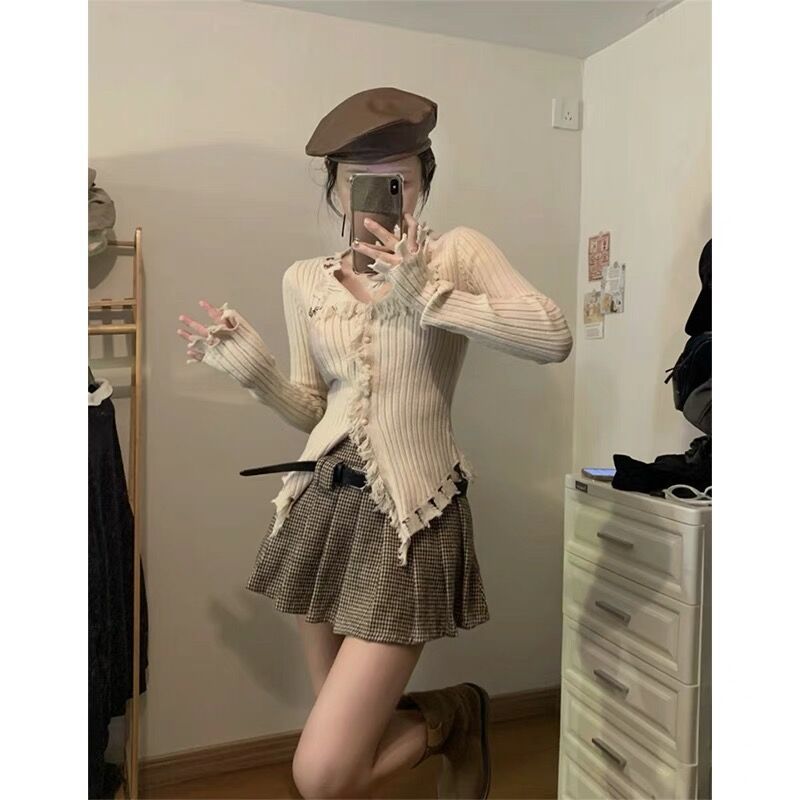Designed tassel solid color cardigan sweater jacket for women in autumn and winter new slim fit niche knitted bottoming top