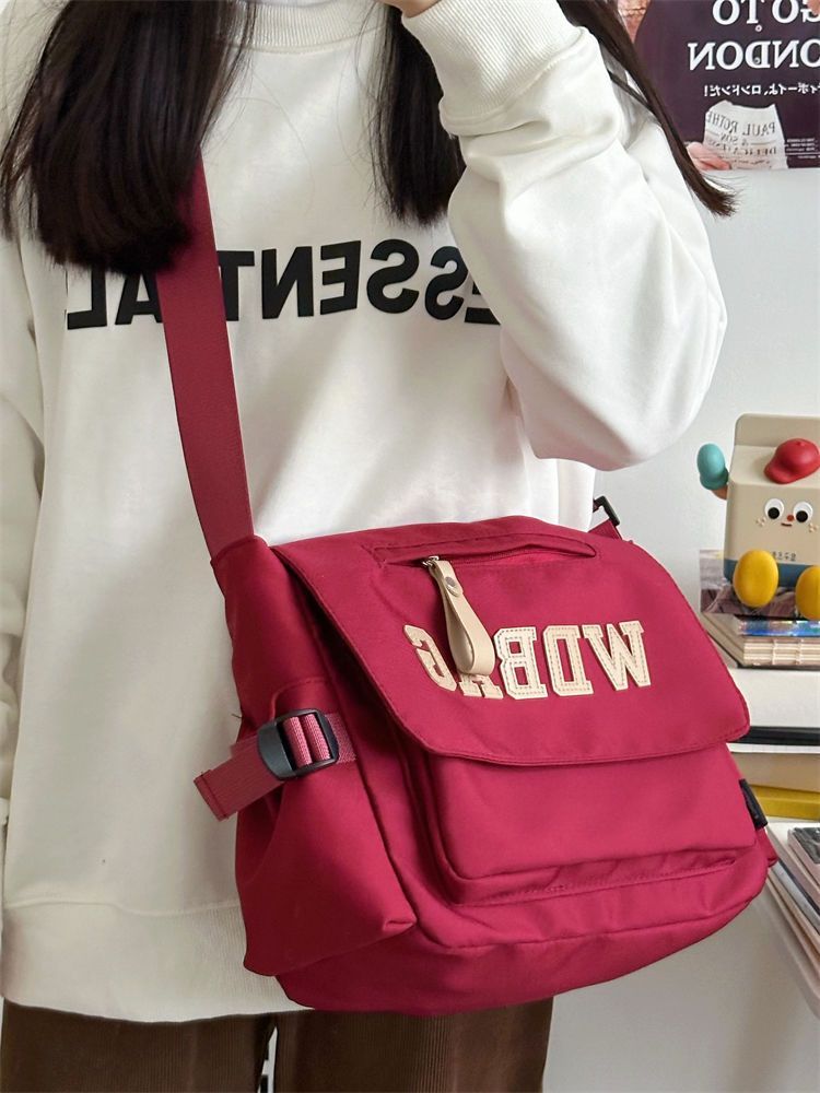 大學生日系港風工裝復古郵差包單肩背包韓版潮牌大容量斜挎包女