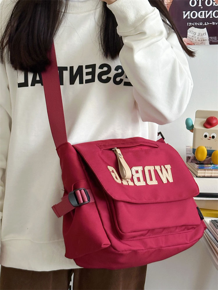 大學生日系港風工裝復古郵差包單肩背包韓版潮牌大容量斜挎包女