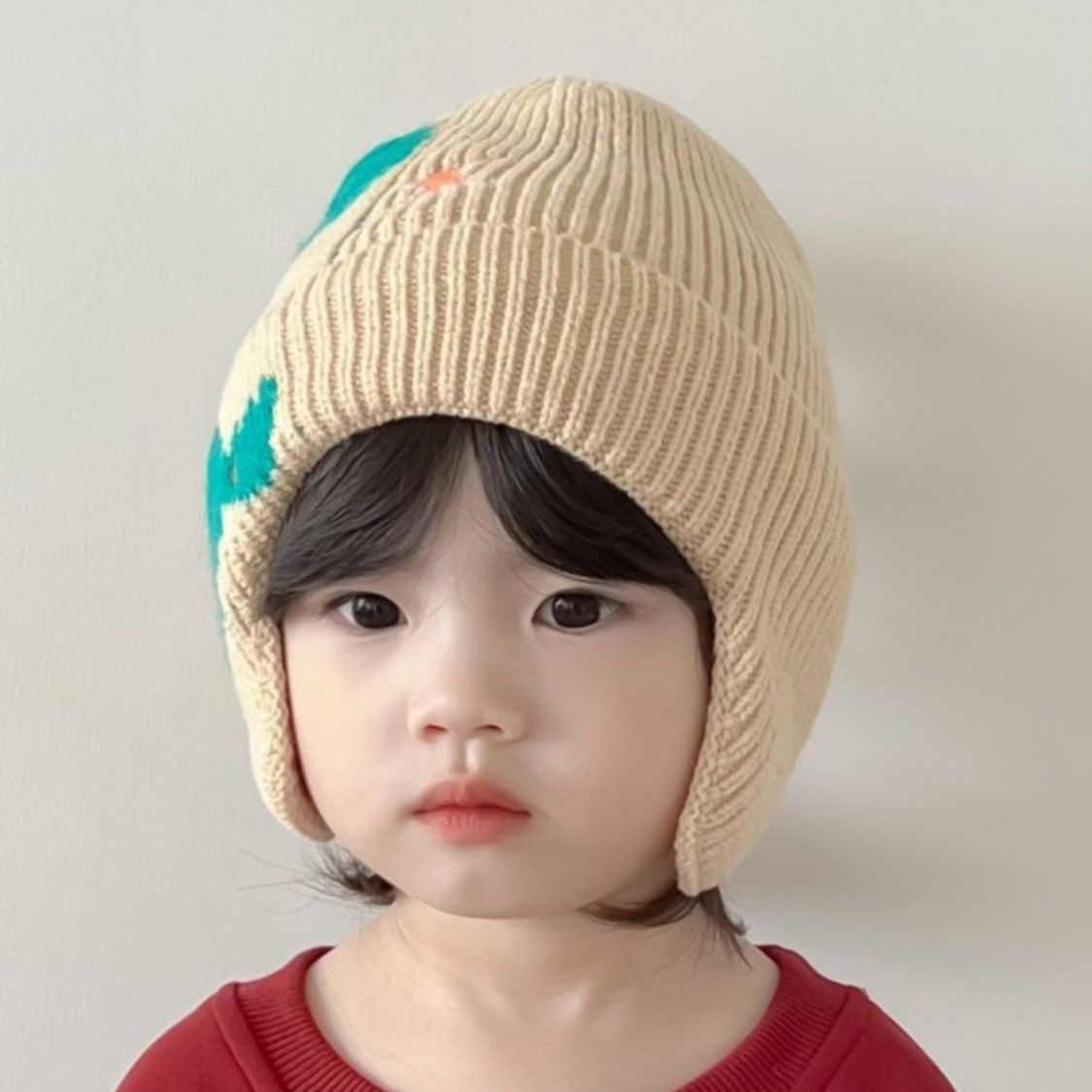 Little dinosaur cartoon windproof winter ear hat for boys and girls, autumn and winter new children's knitted thermal hat_voghion.com