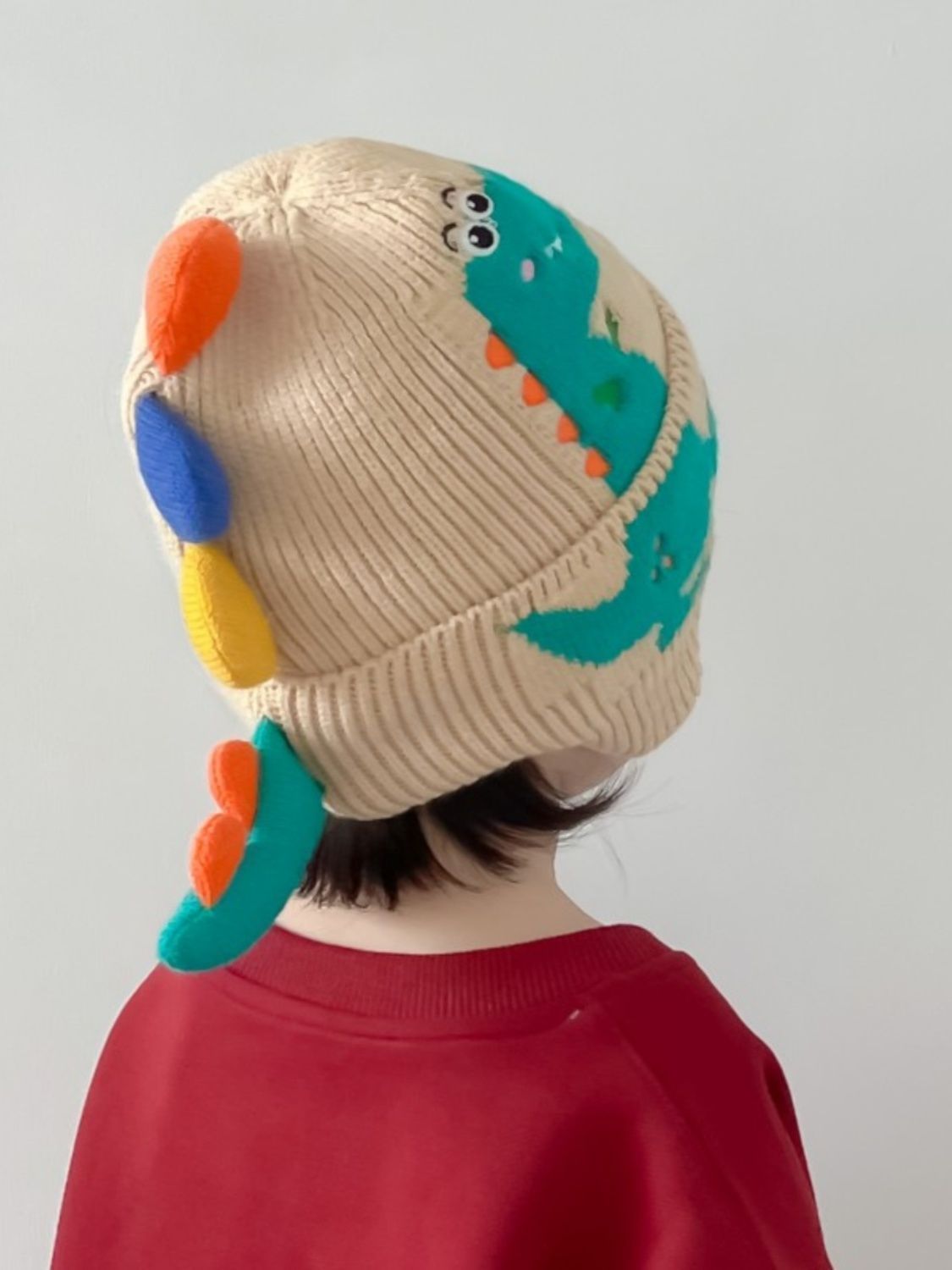 Little dinosaur cartoon windproof winter ear hat for boys and girls, autumn and winter new children's knitted thermal hat_voghion.com