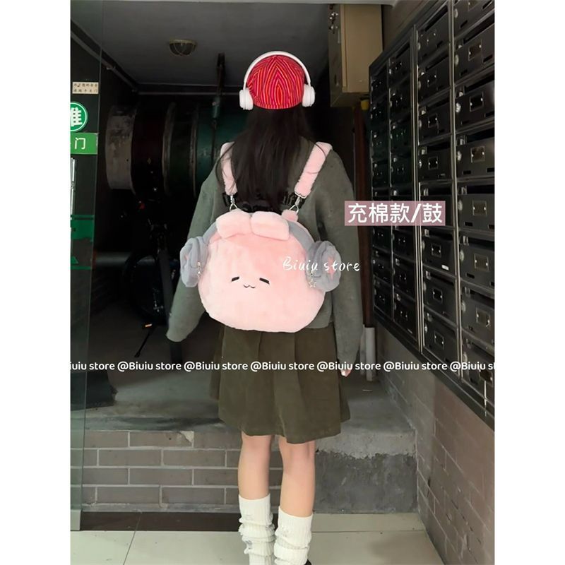 小眾秋冬耳機兔雙肩包包女2023新款可愛毛絨背包學生上課通勤書包