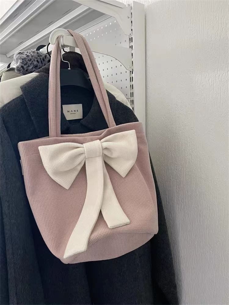 秋冬蝴蝶結單肩包毛呢水桶包韓系甜美簡約聖誕少女上課裝書手提包
