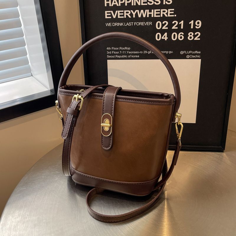 Autumn and winter Maillard handbags for women 2023 new trendy retro contrasting color bucket bag niche versatile crossbody bag