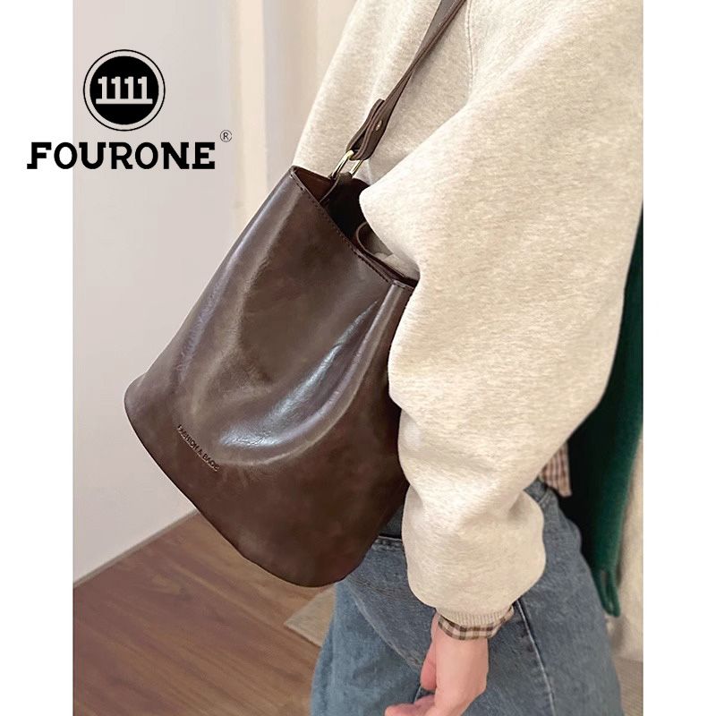 Korean high-end retro bag women's new fashion portable bucket bag niche versatile crossbody bag