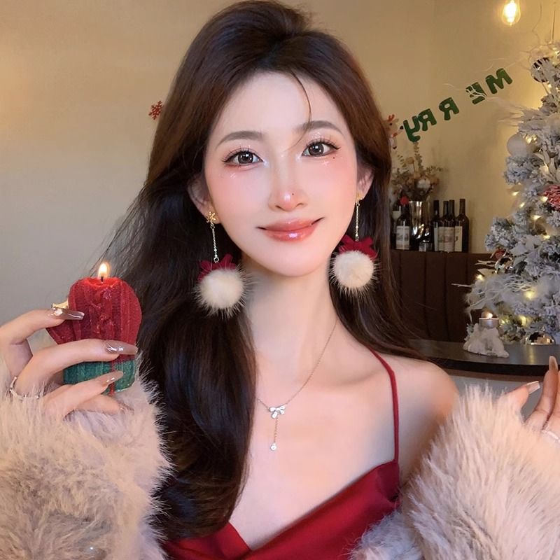 毛絨絨秋冬毛球蝴蝶結耳釘新款2023爆款耳飾女小眾設計高級感耳環