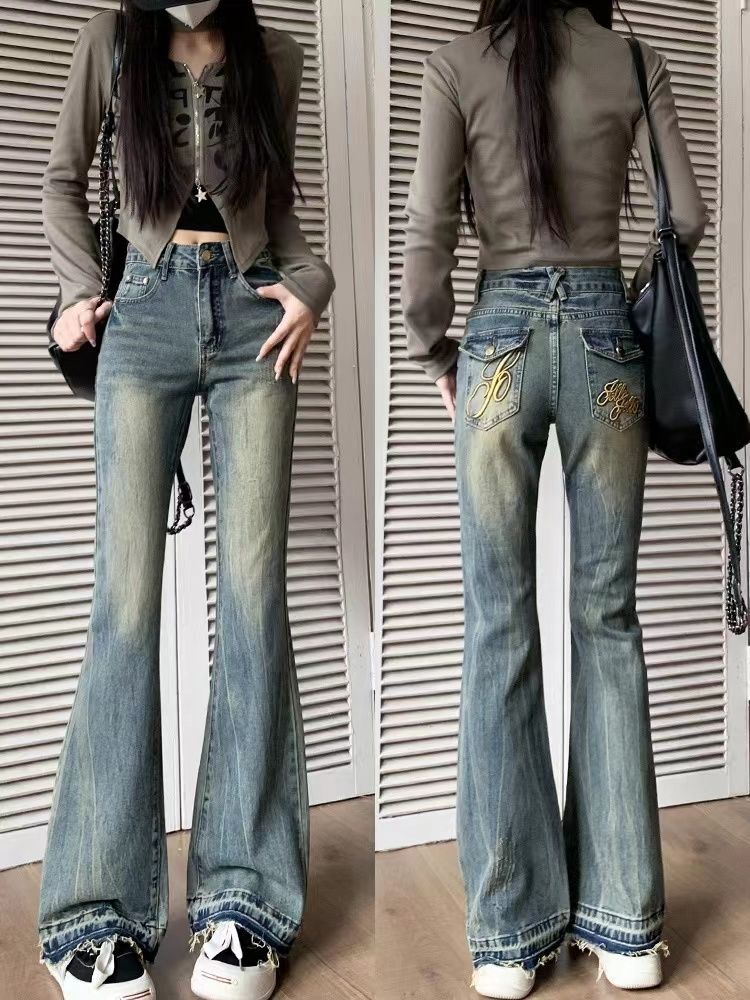 美式復古口袋刺繡微叭牛仔褲女秋冬設計感低腰修身顯瘦毛邊馬蹄褲