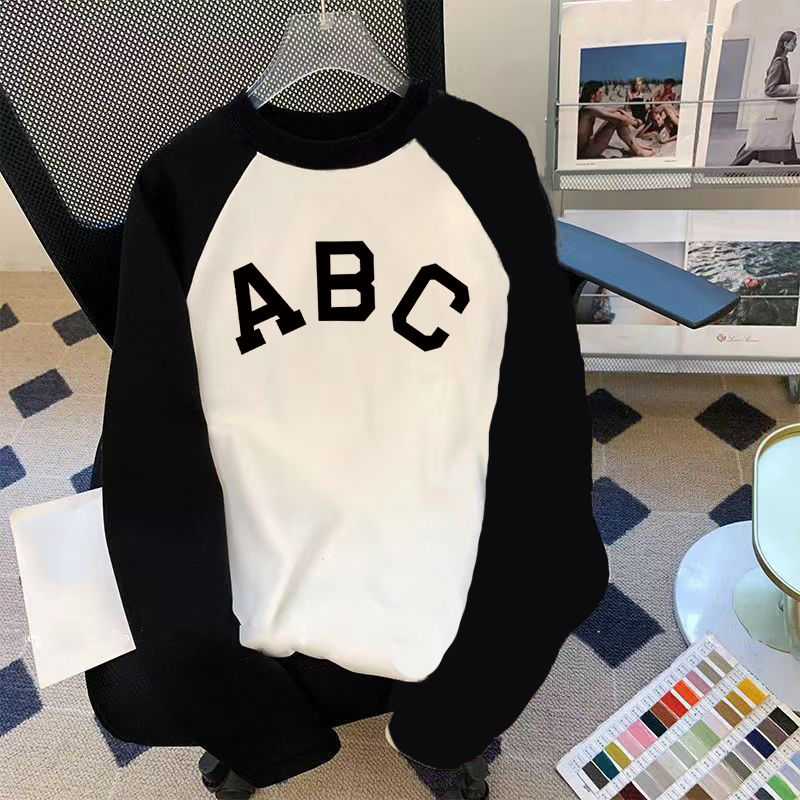 2023 Autumn and Winter pure cotton white and black printed long-sleeved T-shirt women's raglan sleeves loose mid-length bottoming shirt trendy top