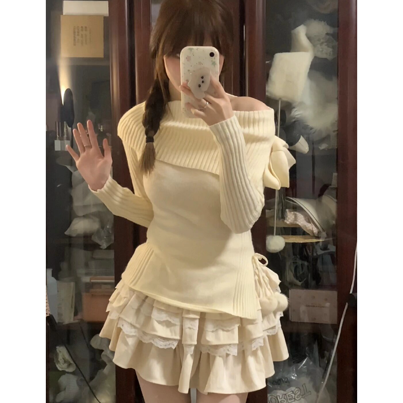套裝女2023冬新款甜美學院風一字肩修身蝴蝶結毛衣高腰蛋糕半身裙