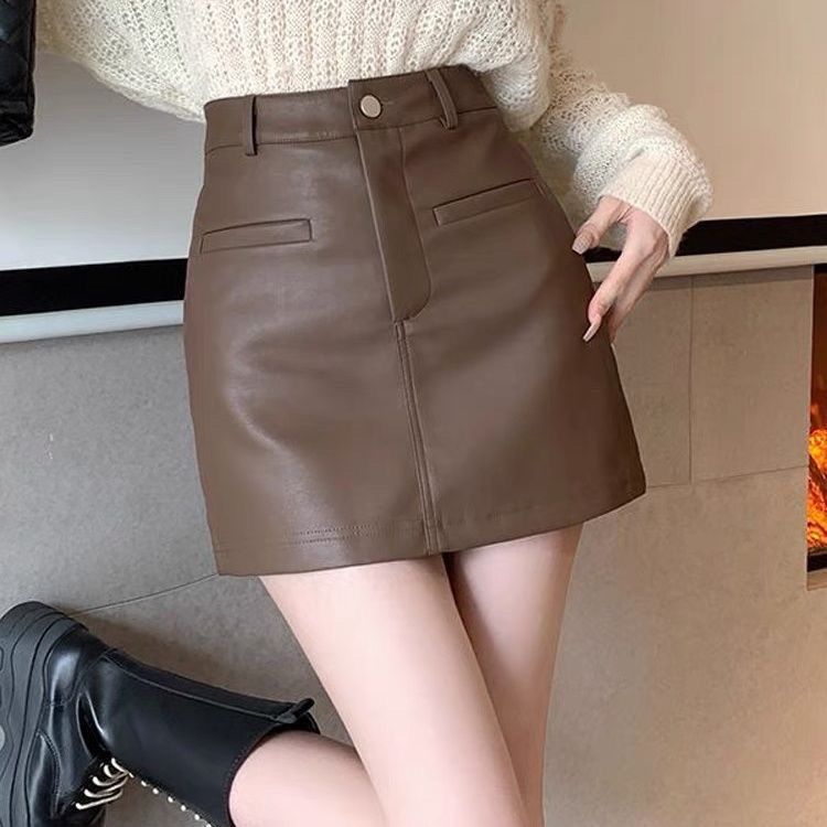  Autumn and Winter PU leather short skirt for women, high waist, slimming, anti-exposure, A-line, hip-hugging skirt, ins trend