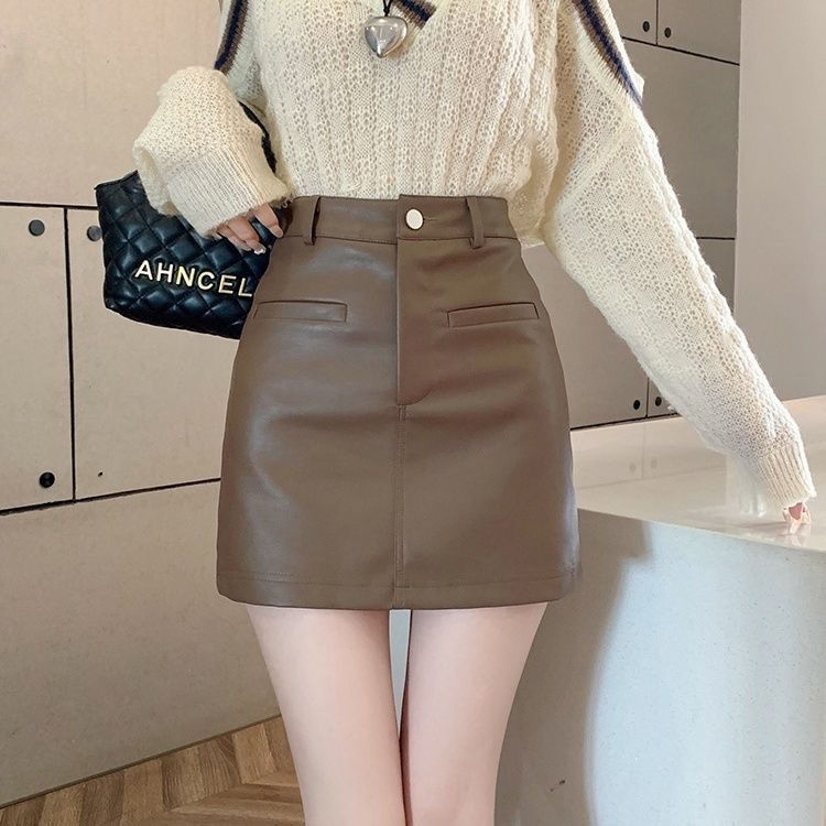  Autumn and Winter PU leather short skirt for women, high waist, slimming, anti-exposure, A-line, hip-hugging skirt, ins trend