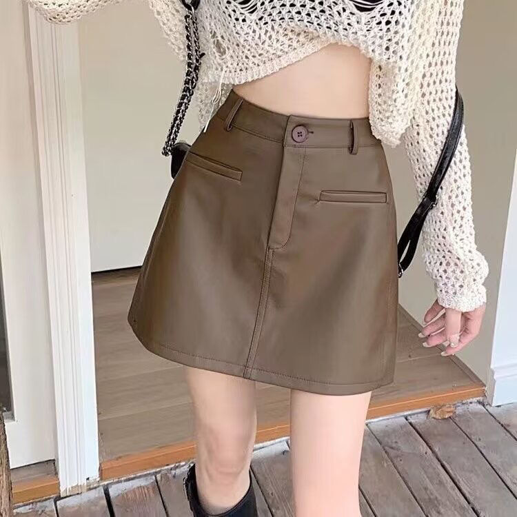  Autumn and Winter PU leather short skirt for women, high waist, slimming, anti-exposure, A-line, hip-hugging skirt, ins trend