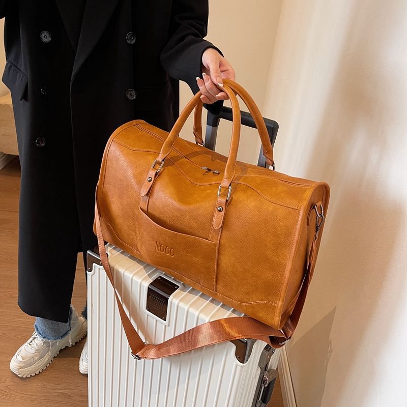 短途旅行包大容量手提登机包收纳袋PU皮轻便运动健身包外出行李袋