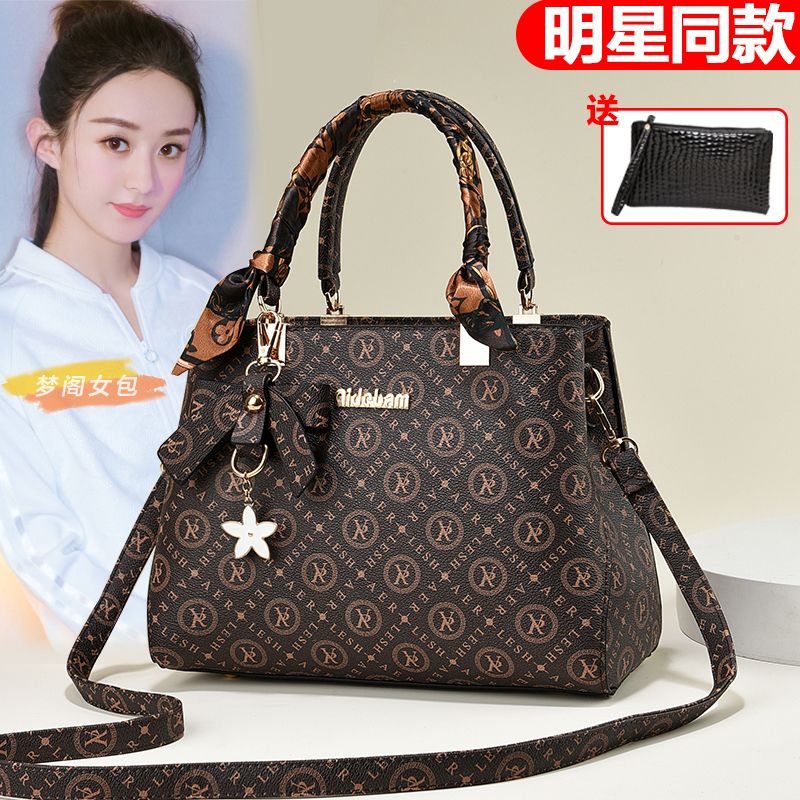 真皮質感女包印花手提包2023新款潮通勤大包時尚大容量單肩斜挎包