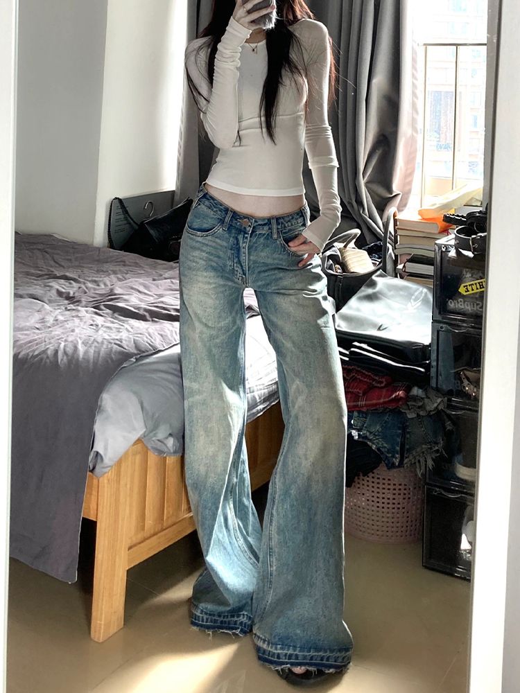 美式低腰微喇叭牛仔褲女秋冬新款設計感毛邊直筒寬鬆闊腿拖地褲子