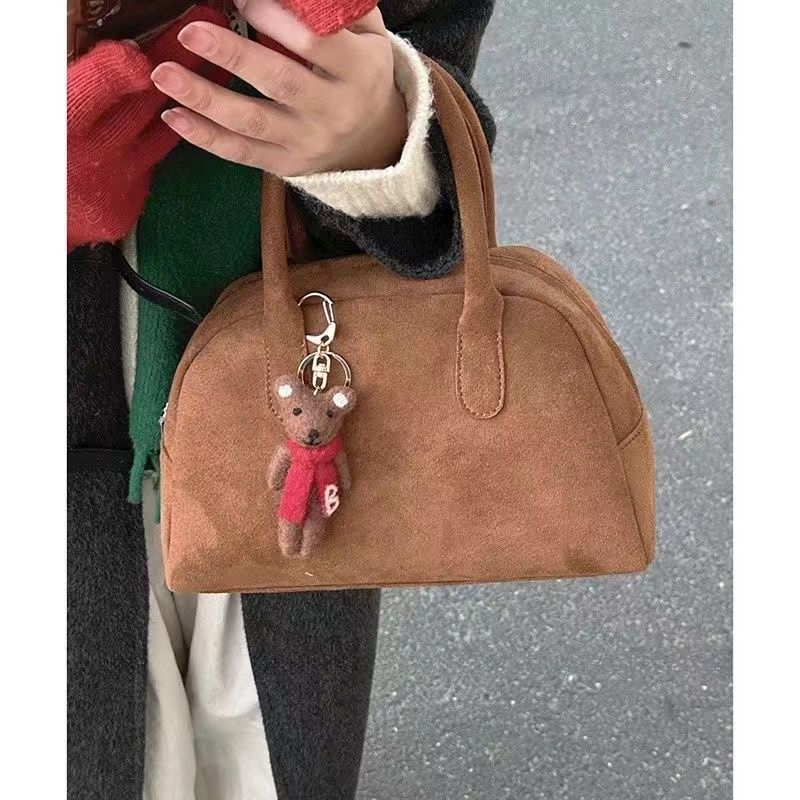 韓復古鹿皮絨保齡球包包秋冬女2024新款潮小眾枕頭包大容量通勤包