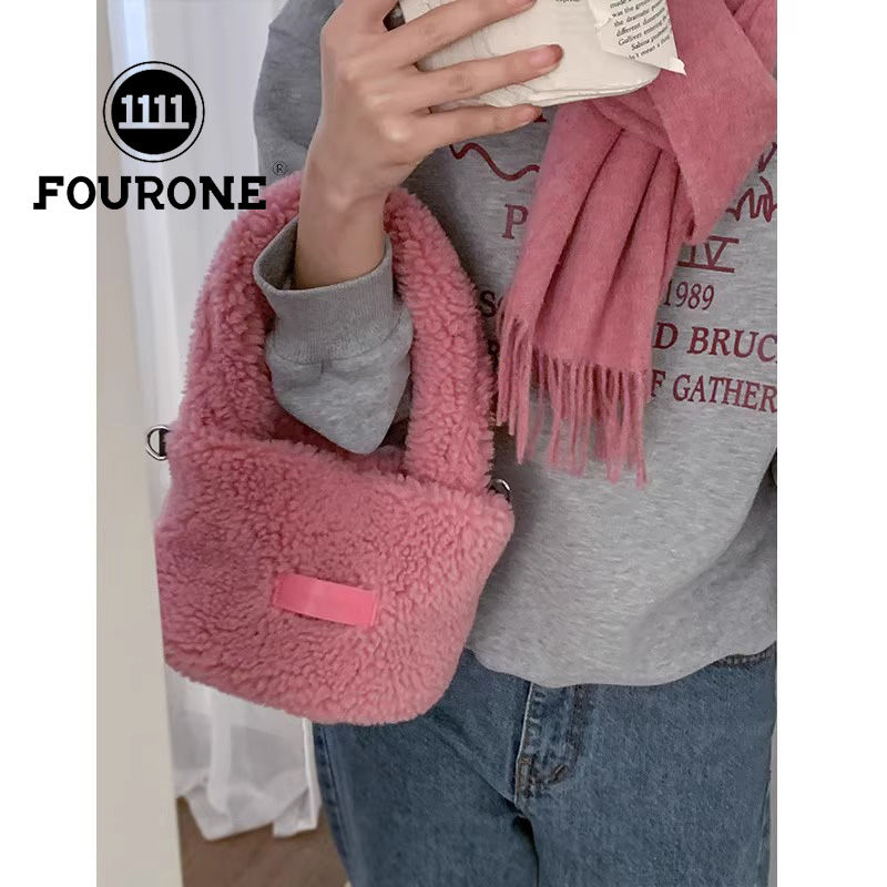 Hand-held plush bag women's new Korean fashion bucket bag high-end niche versatile shoulder bag