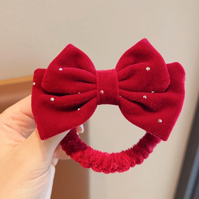 Children's New Year's red ball bow hair girl's New Year baby headwear hair rope girl's head rope rubber band