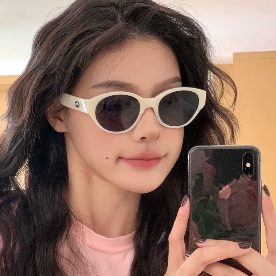 Retro off-white oval concave shape sunglasses street shooting round face ins forest simple sun protection polarized sunglasses