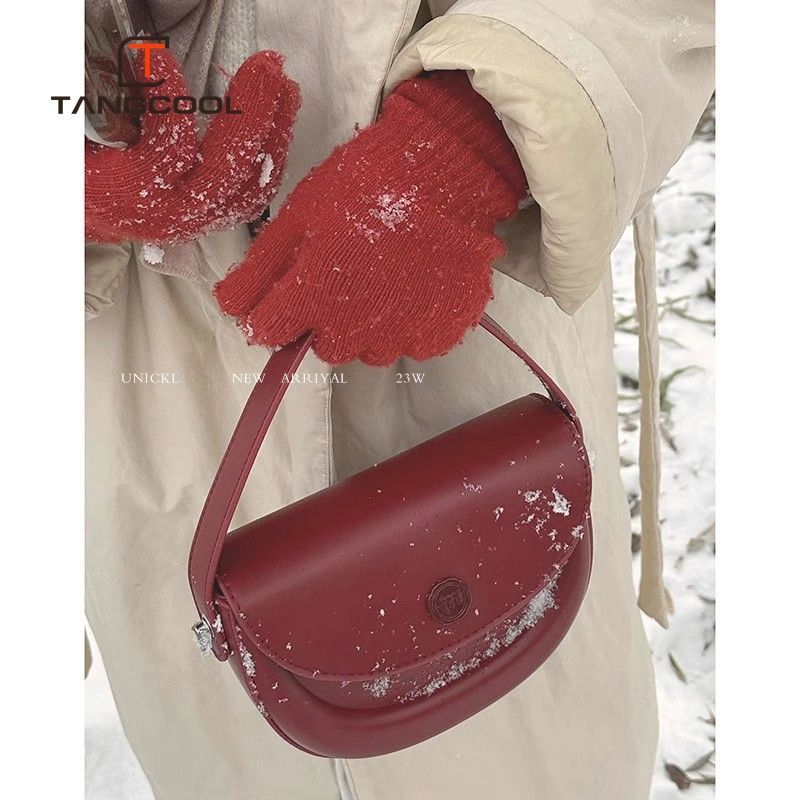 New high-end niche texture retro portable versatile simple retro burgundy semicircle saddle bag for women