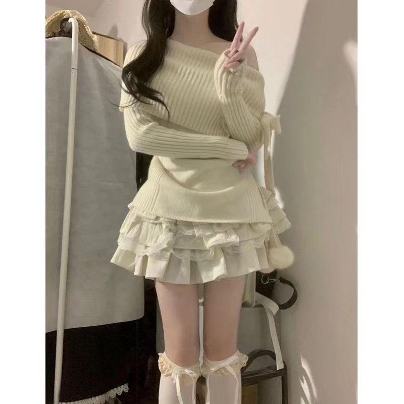 Two-piece suit 2023 autumn and winter new college style design niche one-shoulder knitted sweater + skirt