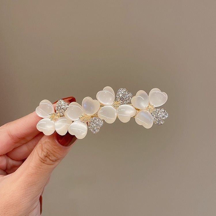 Elegante fermaglio per capelli coreano fiore occhio di gatto_voghion.com