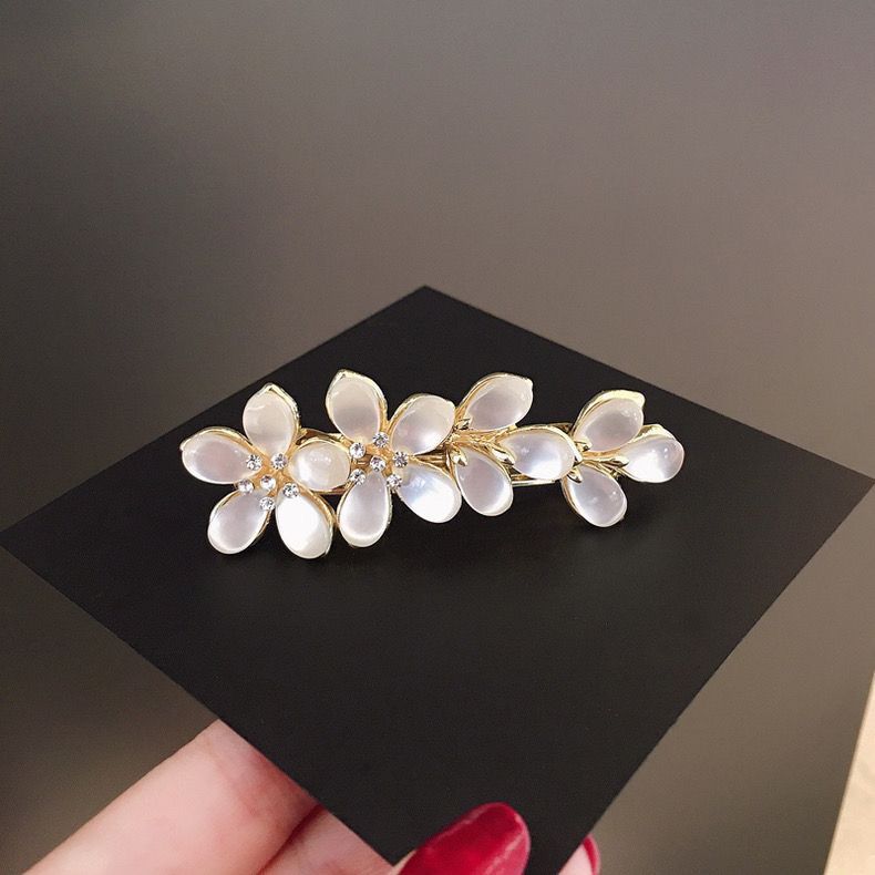Elegante fermaglio per capelli coreano fiore occhio di gatto_voghion.com