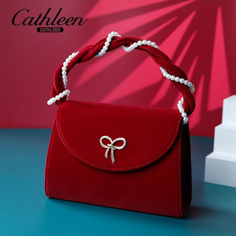 凯思琳手提丝绒红色包包女新款秋冬潮时尚珍珠小方包小众斜挎婚包