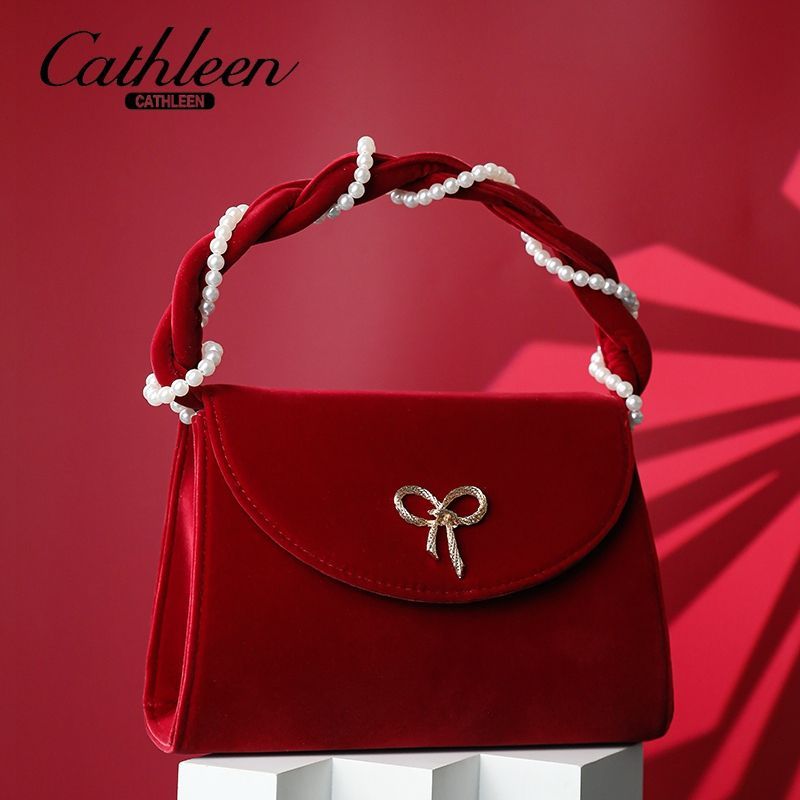 凯思琳手提丝绒红色包包女新款秋冬潮时尚珍珠小方包小众斜挎婚包