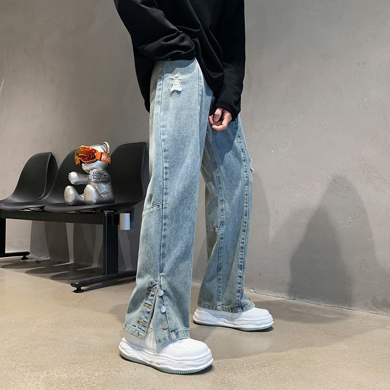 American vibe style high street hip-hop ripped jeans for men in spring and autumn niche design button-down slits and bootcut pants