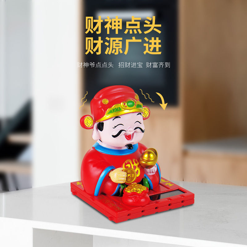 Solar-powered shaking head of the God of Wealth, car center console ornaments, car accessories, high-quality car-mounted creative dolls