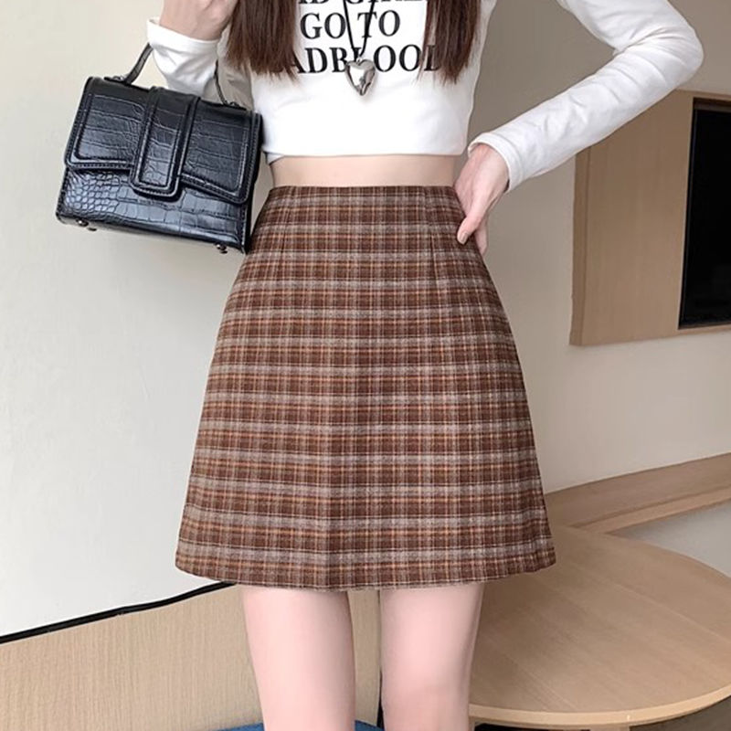 Small plaid A-line skirt is fashionable, slim and tight, hot girl's pure lust style, light luxury and foreign style commuting ins style one-line skirt