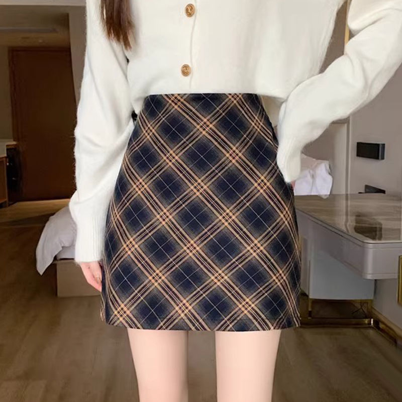 Small retro plaid light luxury slimming age-reducing fashionable commuting slimming cover-up anti-exposure elastic waist one-line skirt