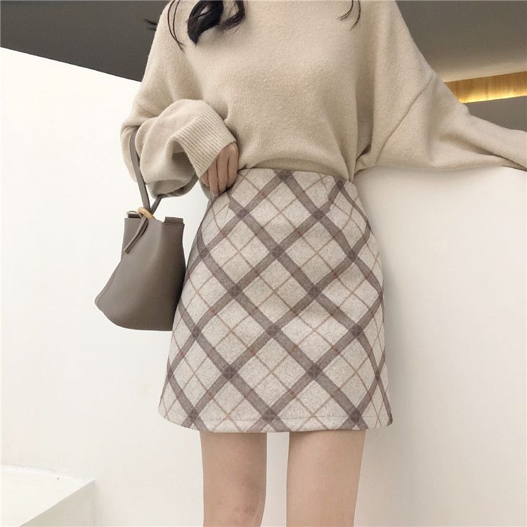 Korean style niche celebrity plaid A-line skirt casual tight sexy hot girl style pure desire light luxury slimming ins one-line skirt