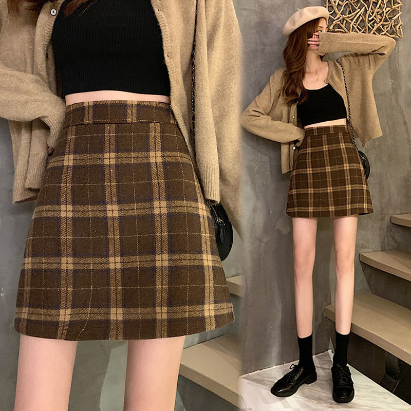 Plaid A-line skirt tight-fitting pure lust style hot girl style sexy light luxury age reduction slimming high waist ins elastic waist straight skirt